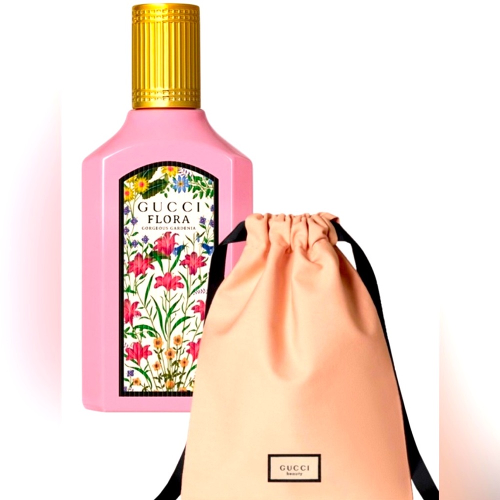 Gucci pink bag new in bag.. Includes mini size 5ml of Gucci Flora Parfum.